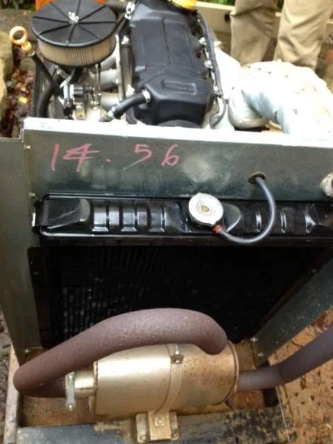 Open frame generator engine radiator rusted exhaust